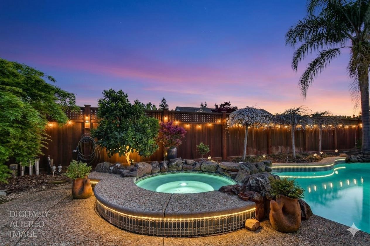 702 Shakeley Lane Ione, CA 95640 - Photo 3 of 71 a view of a fountain in front of a house