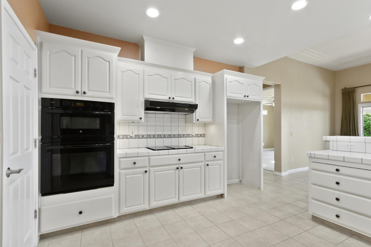 702 Shakeley Lane Ione, CA 95640 - Photo 33 of 71 a kitchen with stainless steel appliances cabinets and a refrigerator
