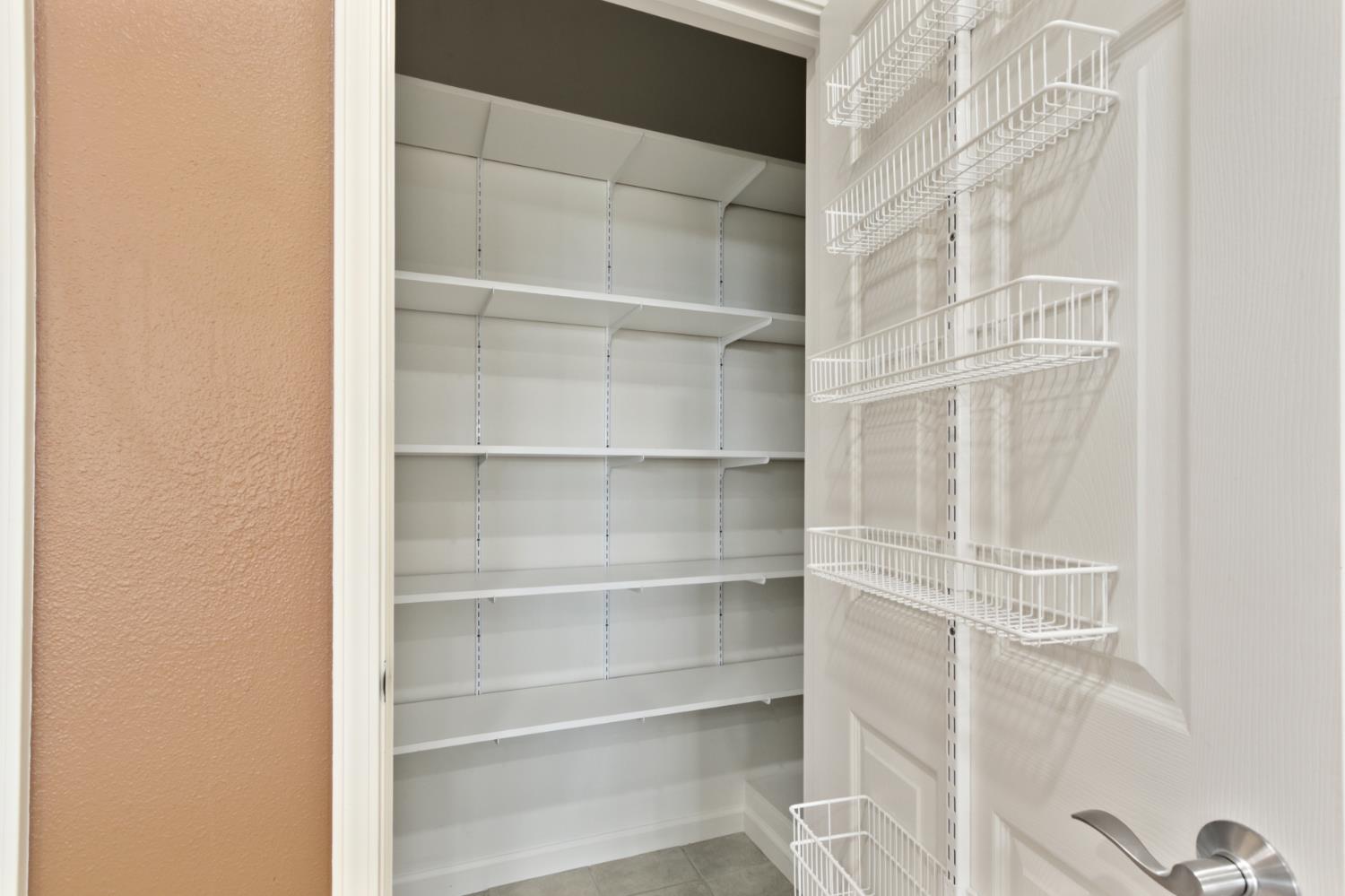 702 Shakeley Lane Ione, CA 95640 - Photo 37 of 71 a view of a room with shelf on the wall