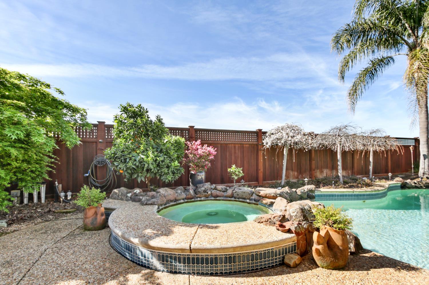 702 Shakeley Lane Ione, CA 95640 - Photo 59 of 71 a view of a swimming pool with a patio