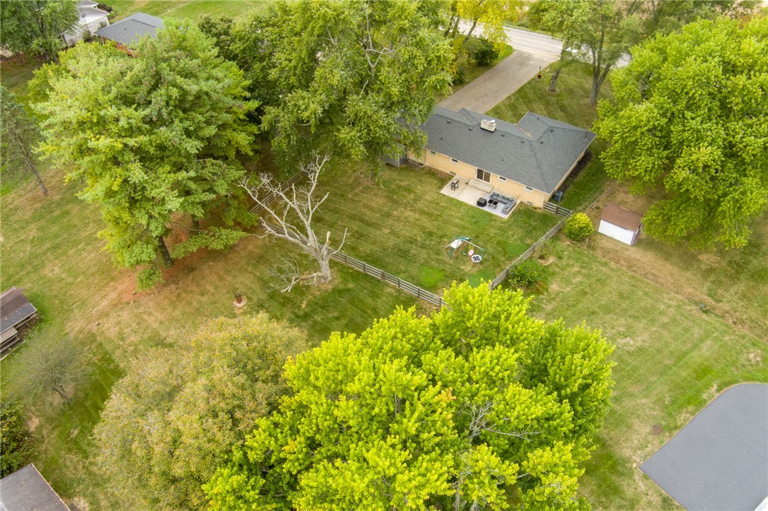 6950 Red Lion 5 Points Road Springboro, OH 45066 - Photo 72 of 78 This verdant property features a sprawling backyard, perfect for outdoor recreation and peaceful relaxation.