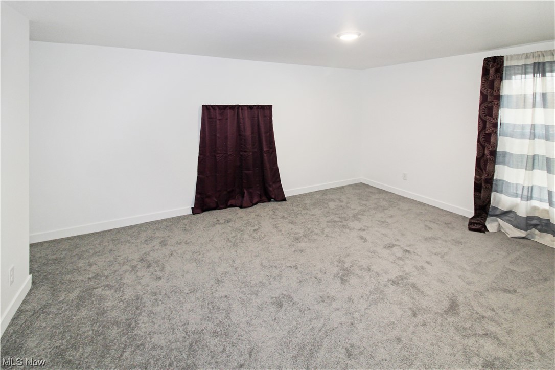 2148 Napoleon Road Fremont, OH 43420 - Photo 30 of 32 Unfurnished room with light carpet