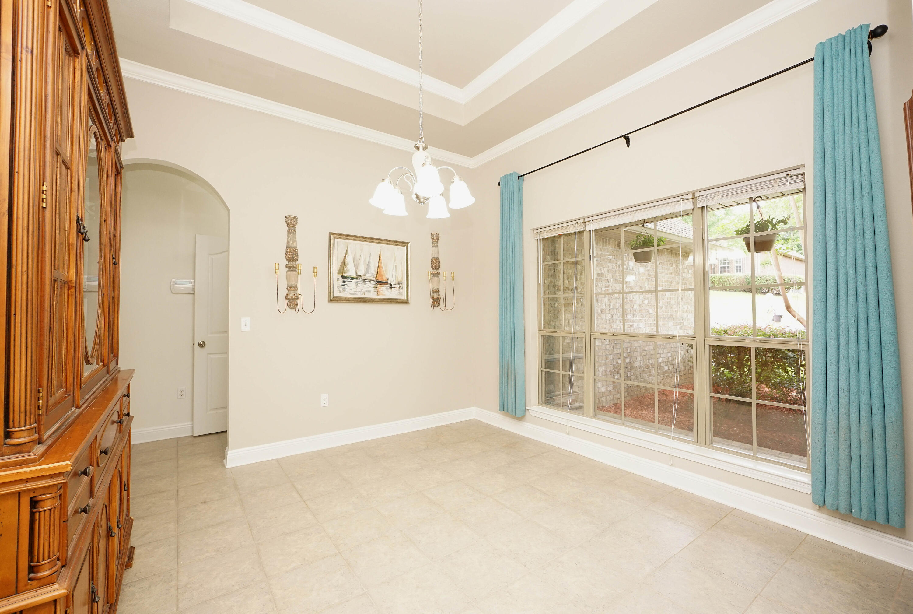 614 Red Fern Road Crestview, FL 32536 - Photo 19 of 43 an empty room with windows