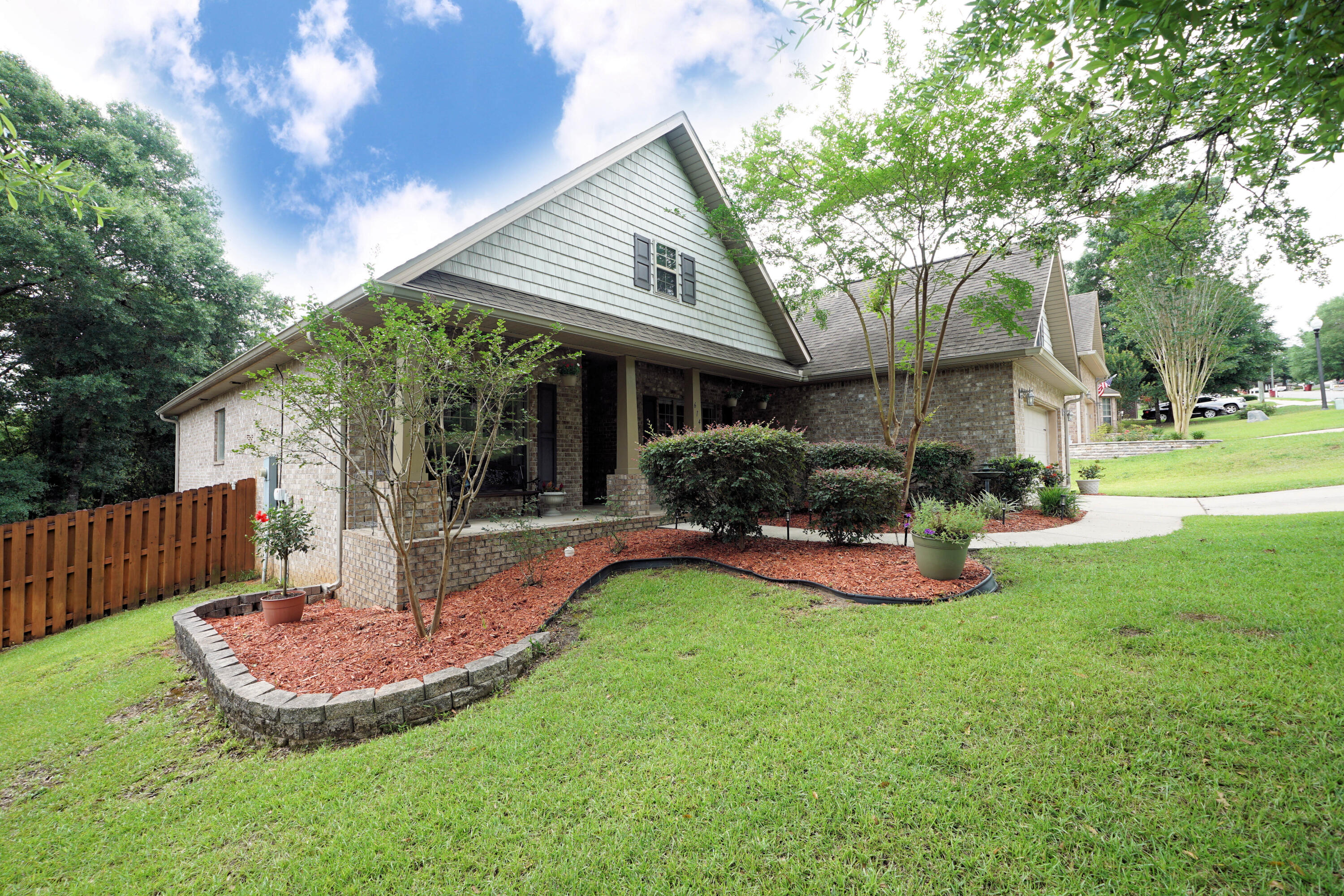 614 Red Fern Road Crestview, FL 32536 - Photo 2 of 43 a view of a house with backyard and porch