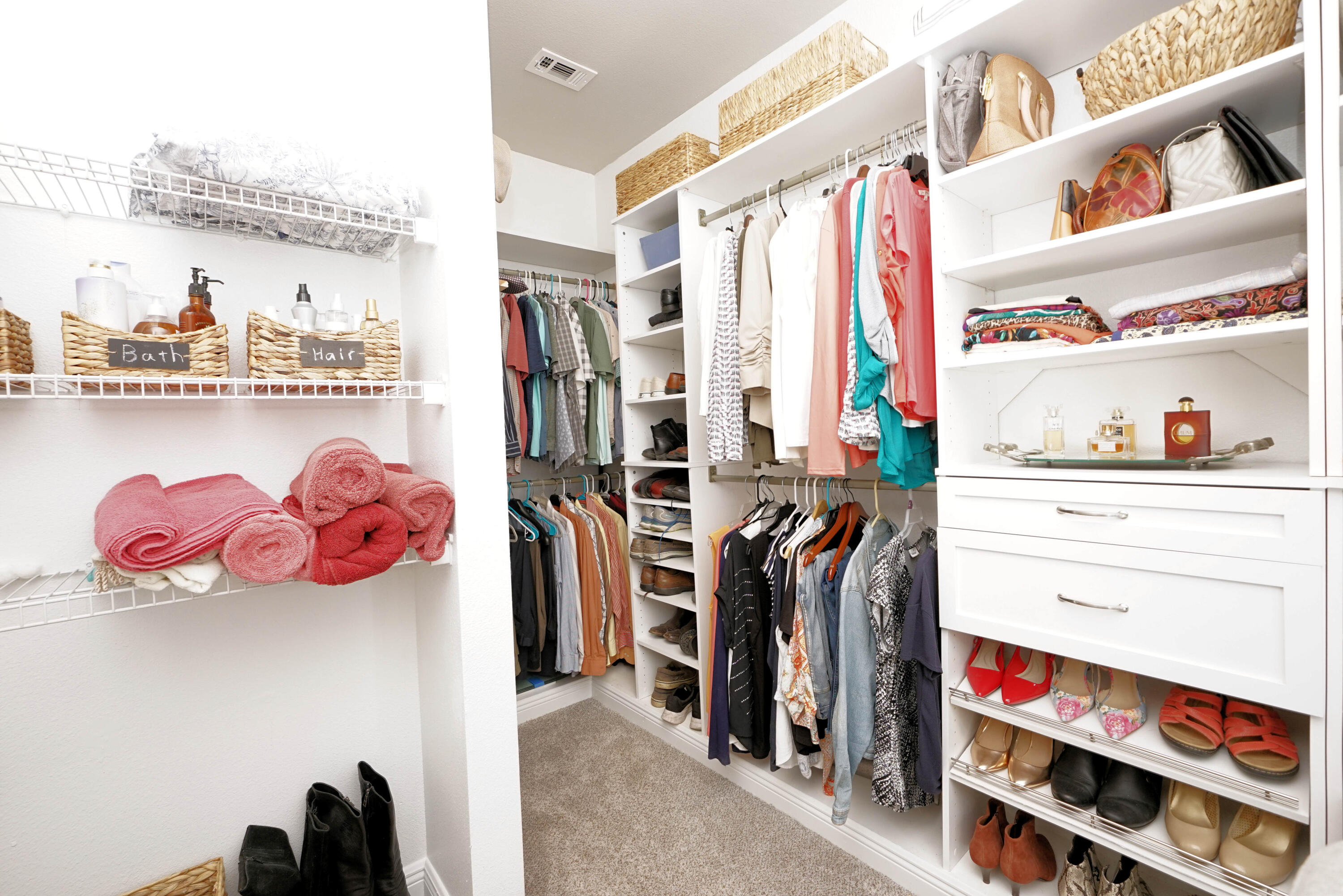 614 Red Fern Road Crestview, FL 32536 - Photo 26 of 43 a view of walk in closet with clothes and shoes