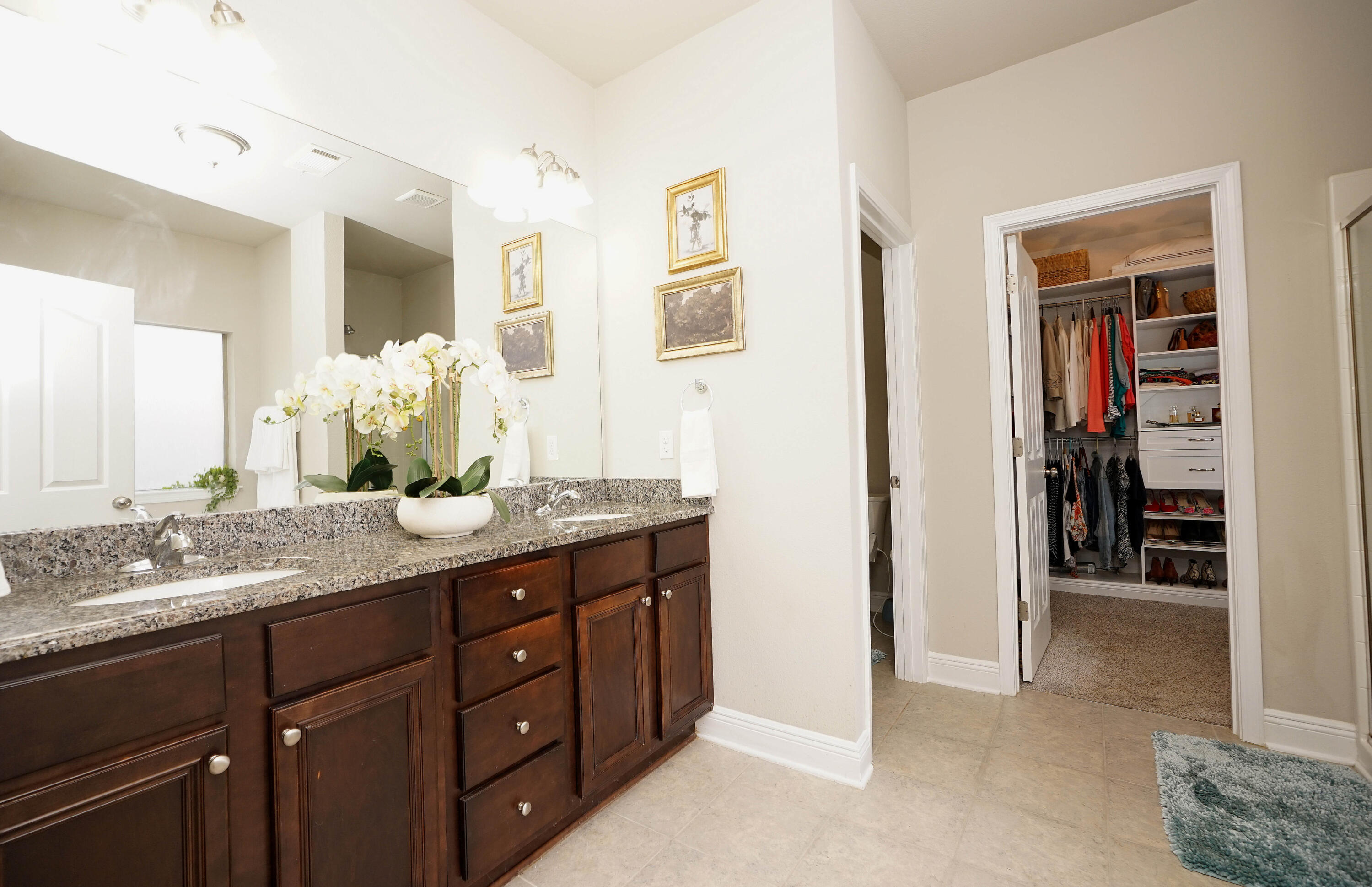 614 Red Fern Road Crestview, FL 32536 - Photo 27 of 43 a bathroom with a granite countertop sink a mirror and a