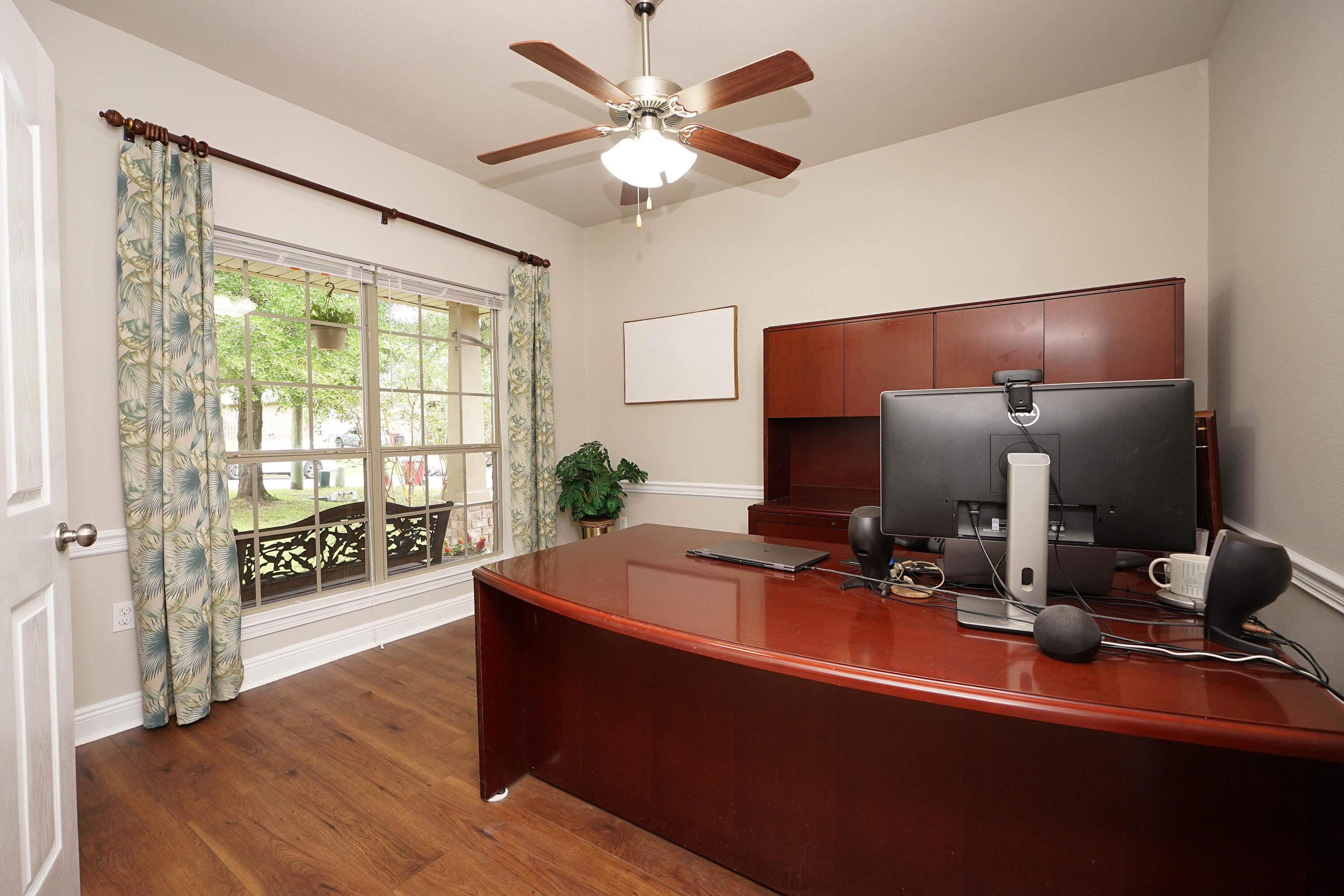 614 Red Fern Road Crestview, FL 32536 - Photo 28 of 43 a view of a workspace with furniture and a window
