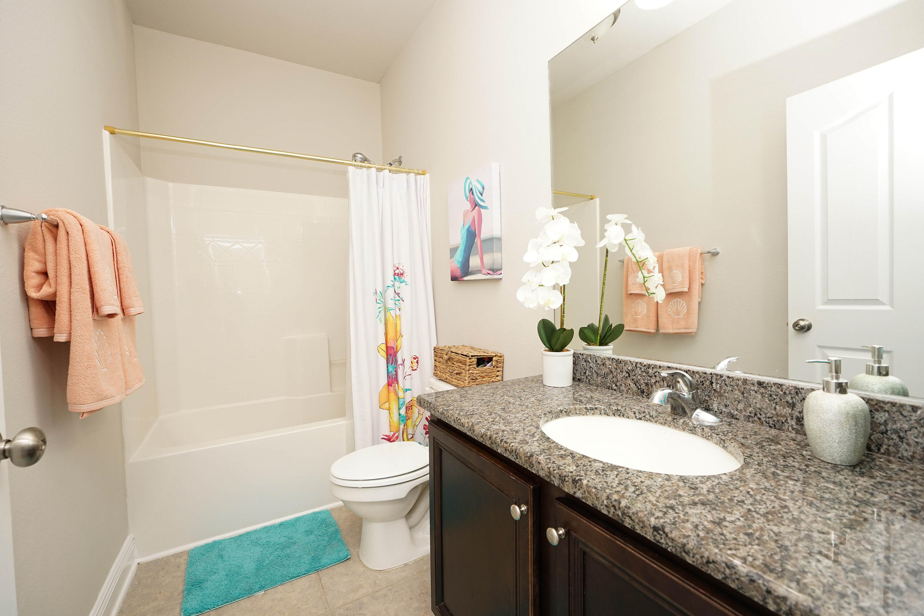 614 Red Fern Road Crestview, FL 32536 - Photo 32 of 43 a bathroom with a granite countertop sink toilet and shower