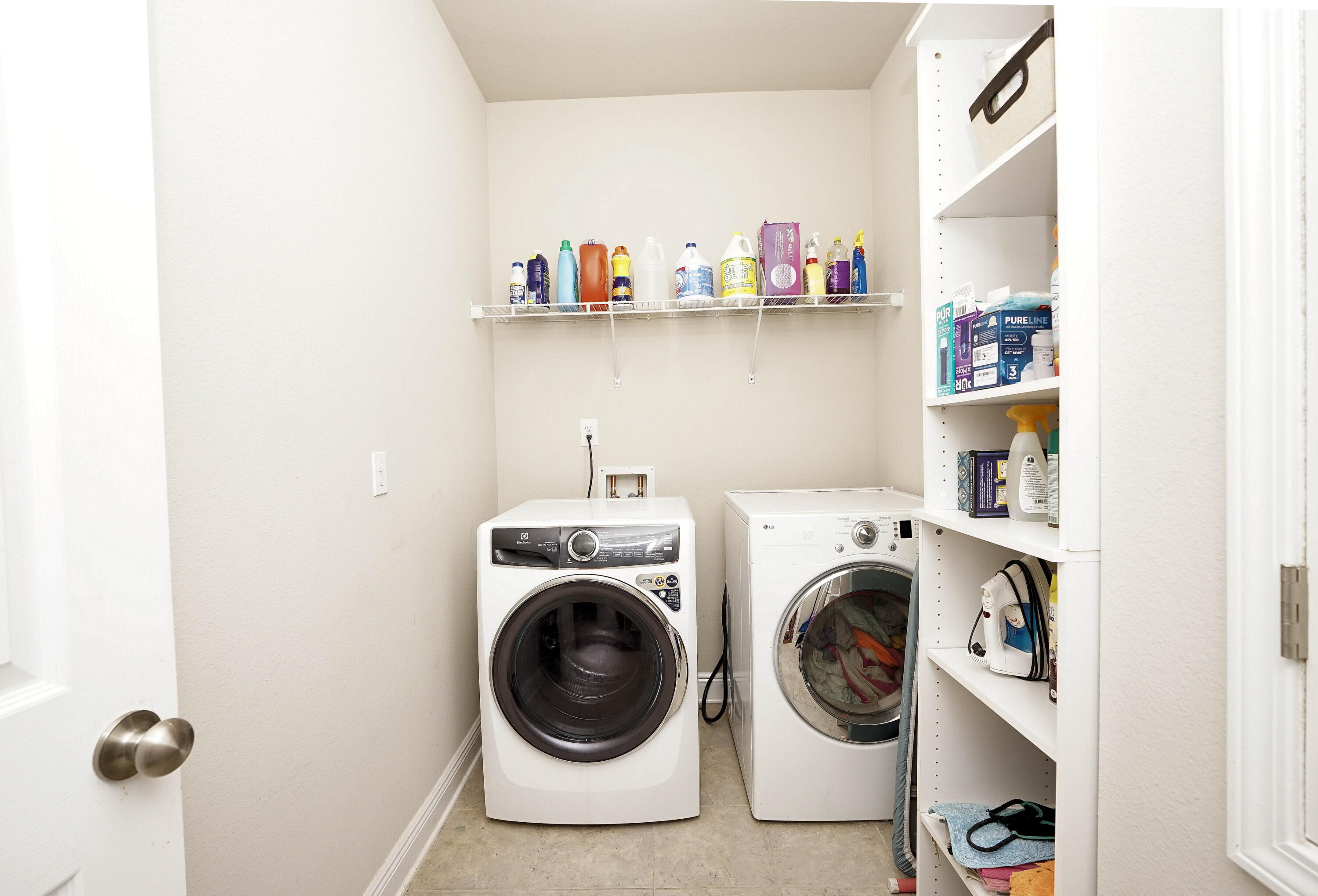 614 Red Fern Road Crestview, FL 32536 - Photo 33 of 43 a utility room with dryer and washer