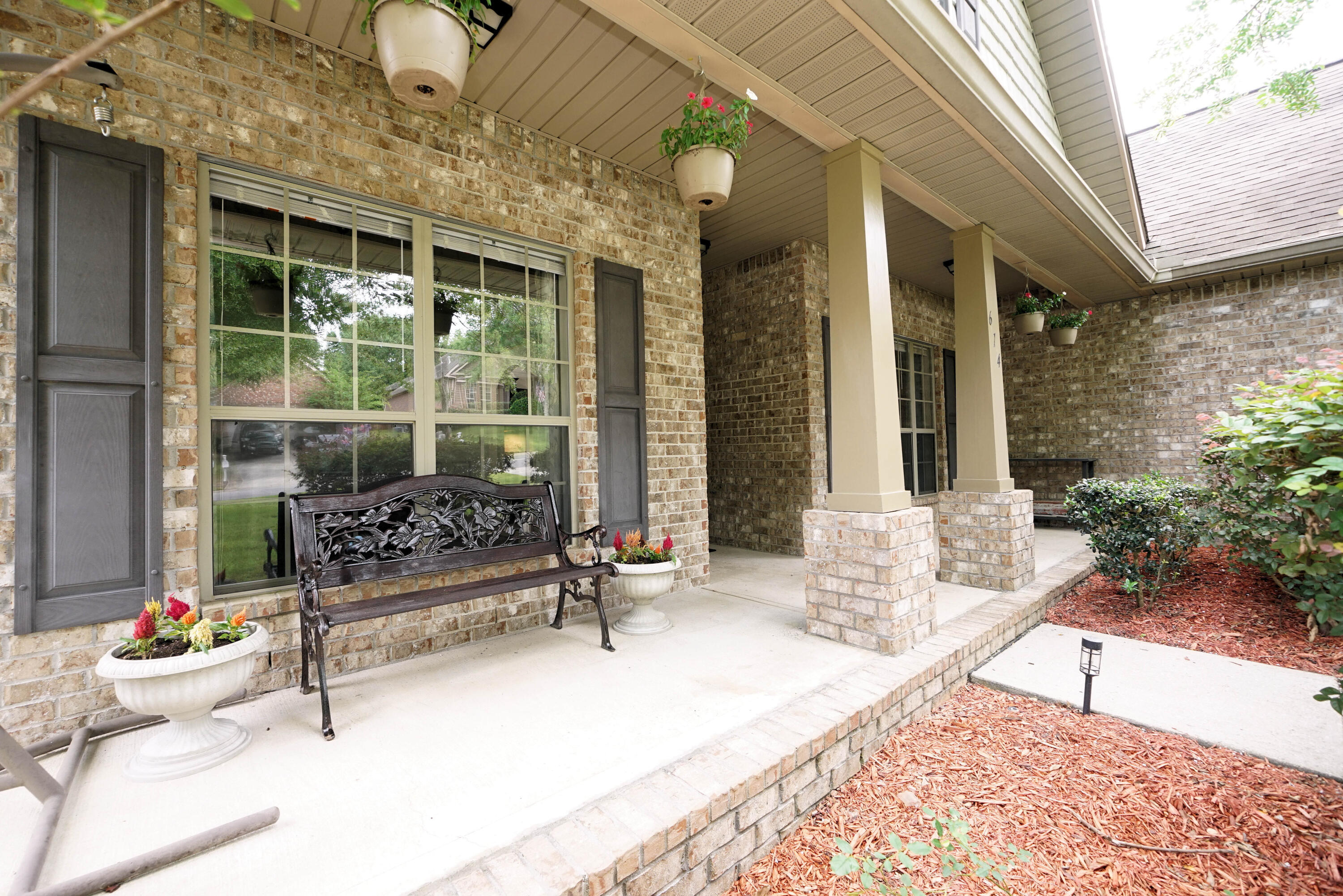614 Red Fern Road Crestview, FL 32536 - Photo 4 of 43 a building outdoor space with patio furniture