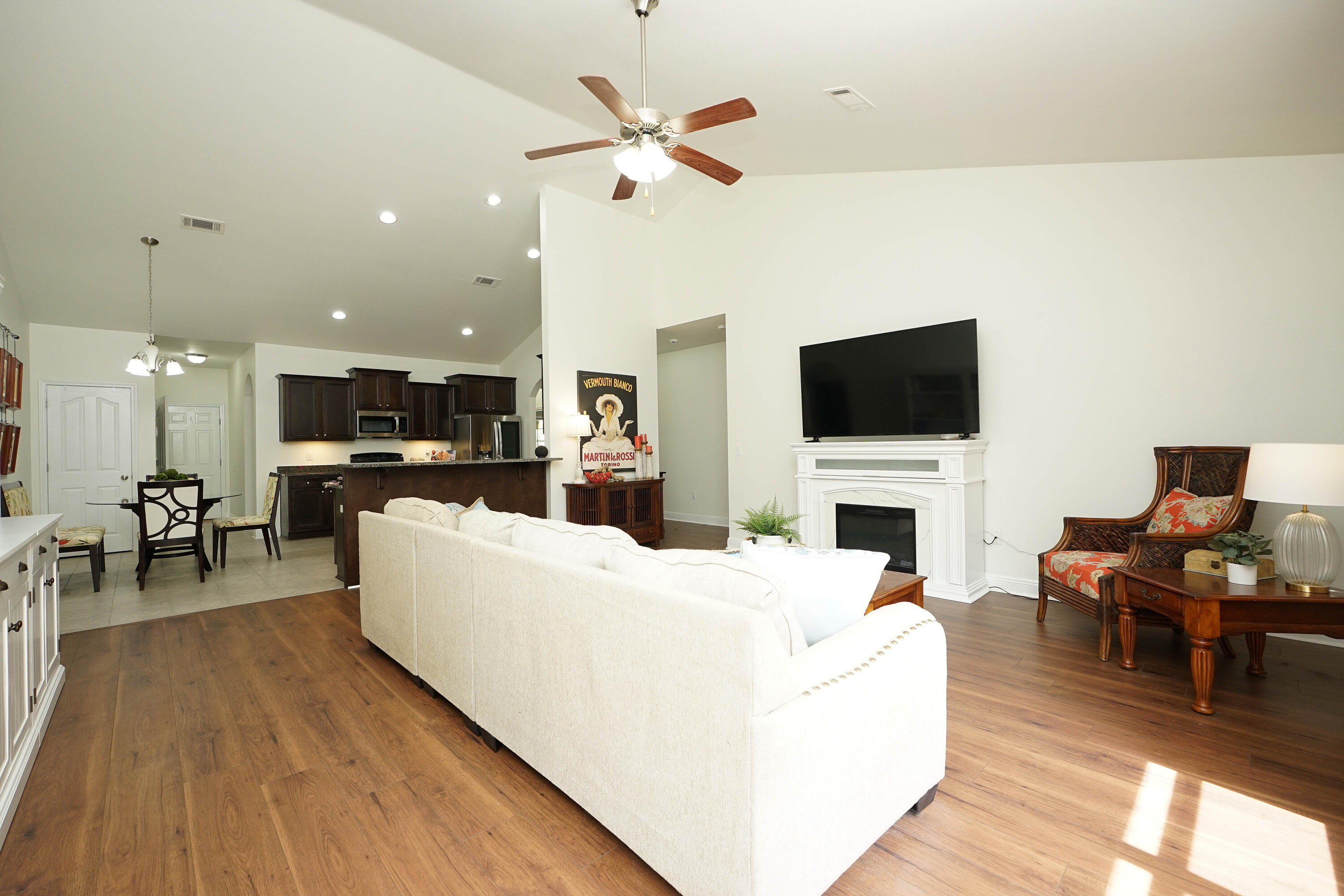 614 Red Fern Road Crestview, FL 32536 - Photo 9 of 43 a living room with furniture and a flat screen tv