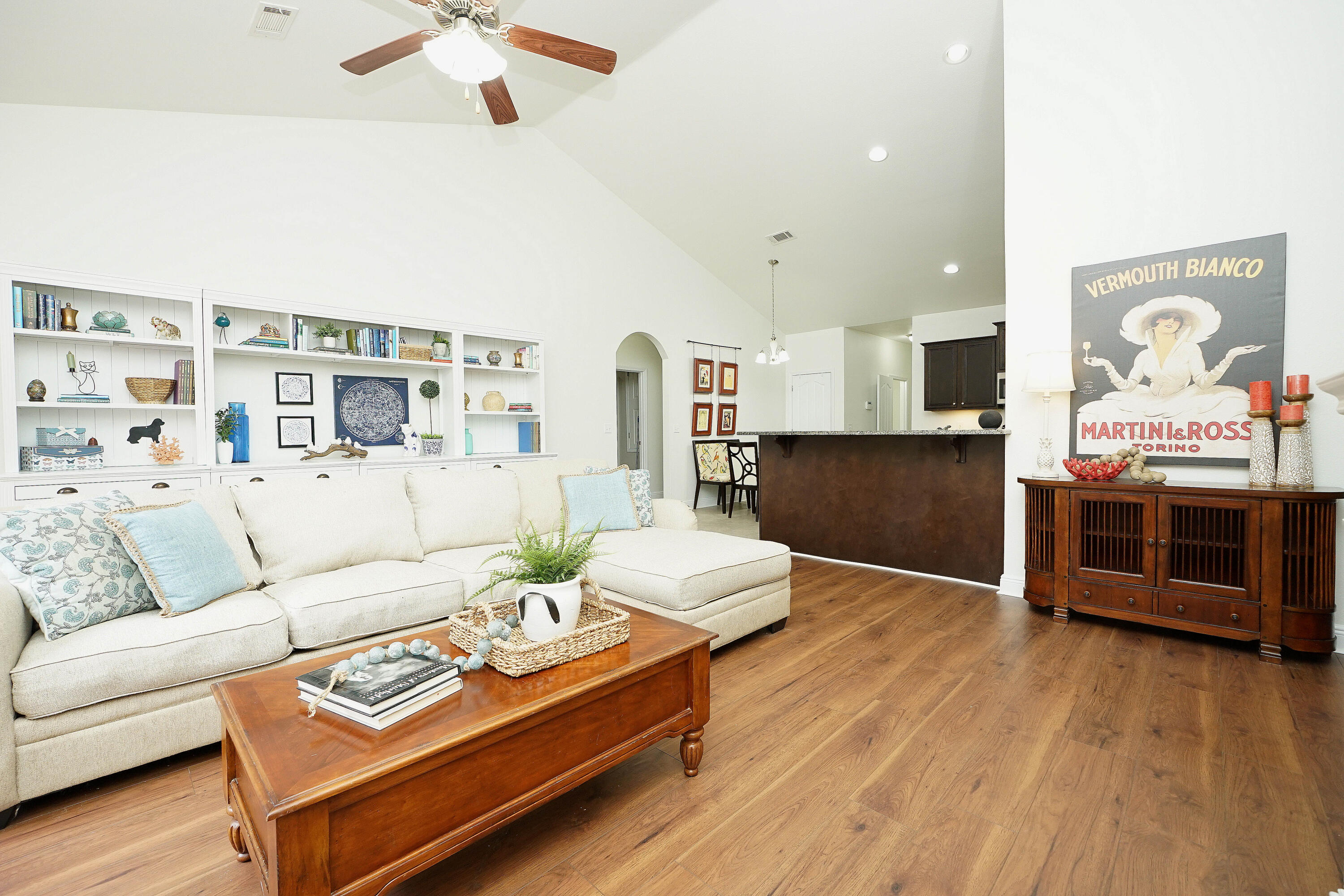 614 Red Fern Road Crestview, FL 32536 - Photo 10 of 43 a living room with furniture and wooden floor