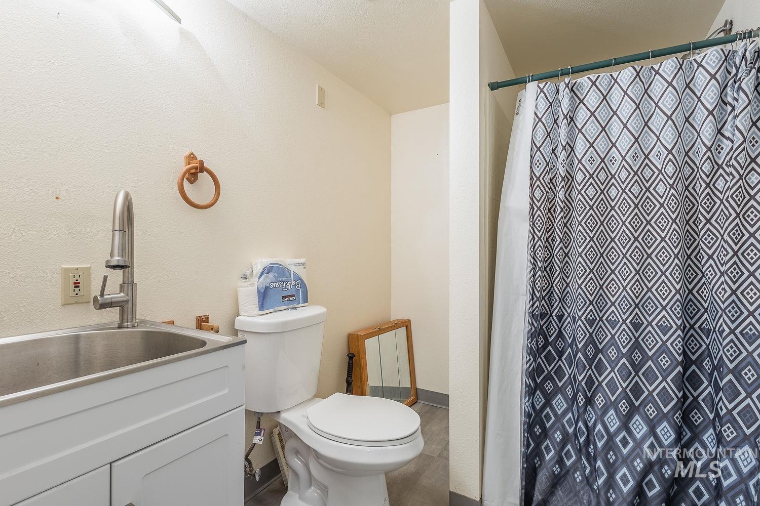 6050 Elmore Road Fruitland, ID 83619 - Photo 32 of 48 Full bath with vanity and a stall shower