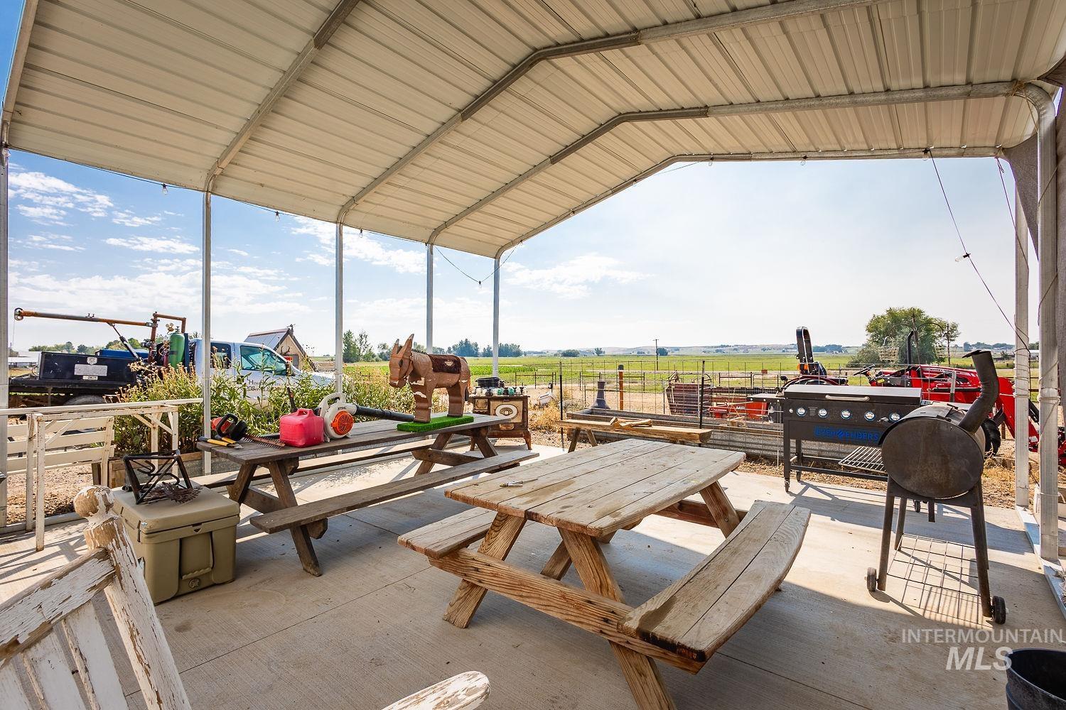 6050 Elmore Road Fruitland, ID 83619 - Photo 36 of 48 View of patio / terrace with a view of countryside