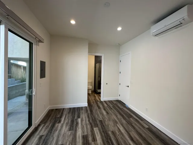 a view of wooden floor in an empty room