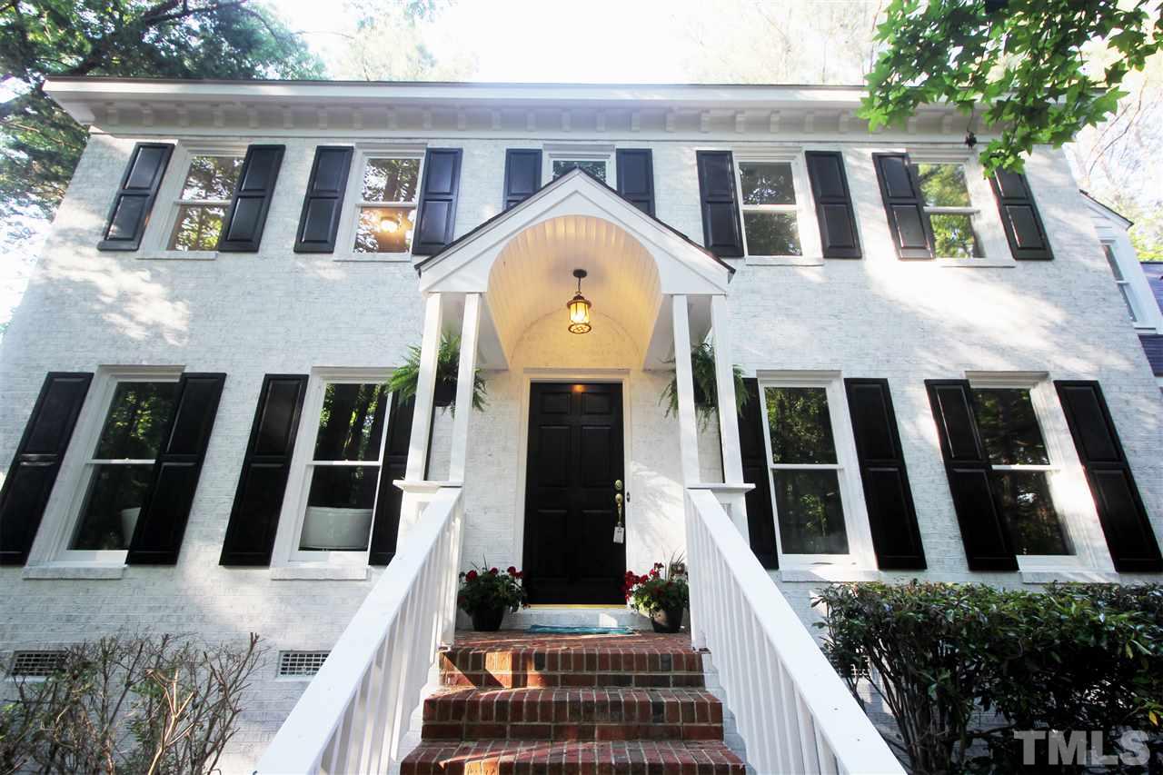 4908 Fielding Drive Raleigh, NC 27606 - Photo 2 of 25 This stately Southerner charmer is more than just a pretty face! It is nestled on stunning Another view of the front. The entire exterior was painted with fresh white paint, white gloss trim, and black shutters and doors. Classic, timeless, and beautiful.