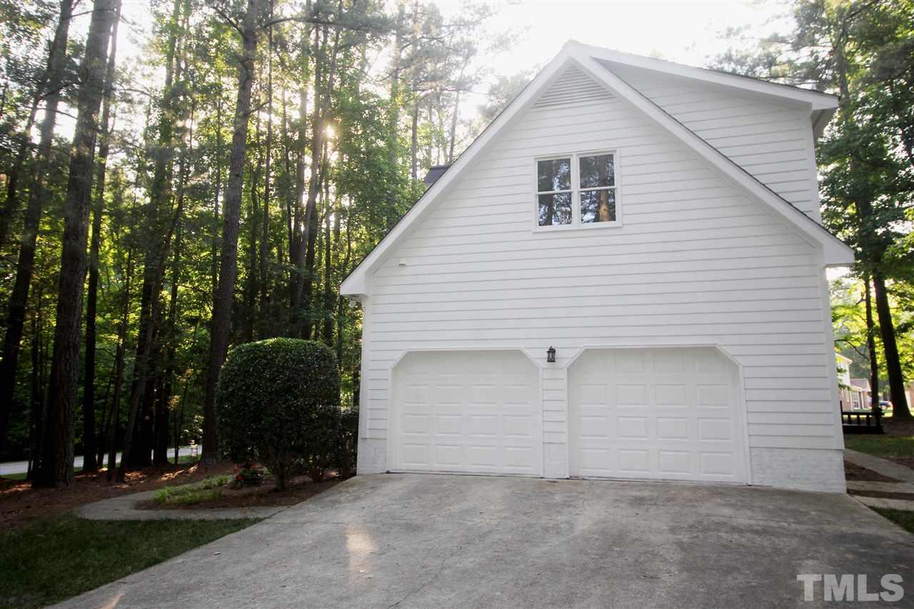 4908 Fielding Drive Raleigh, NC 27606 - Photo 22 of 25 This two car garage has a side entry. It is an oversized garage that has plenty of space to add cabinets or a work bench. There is a door that leads to the kitchen and there is also another door that leads to the backyard.