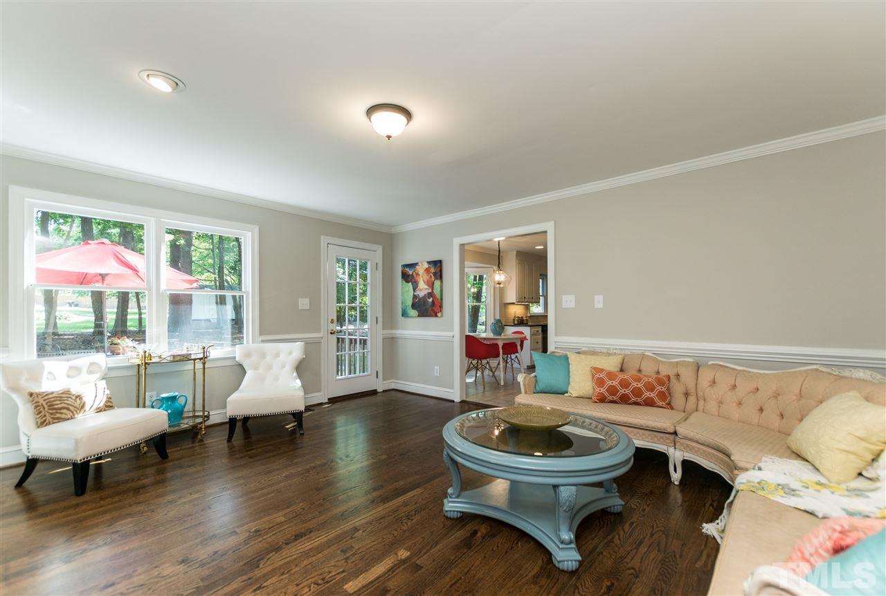 4908 Fielding Drive Raleigh, NC 27606 - Photo 5 of 25 This home has beautifully refinished hardwoods done in a rich walnut satin finish. The view out of the family room windows and onto the backyard is mesmerizing! Watch the birds & squirrels during the day and fireflies light up the night!