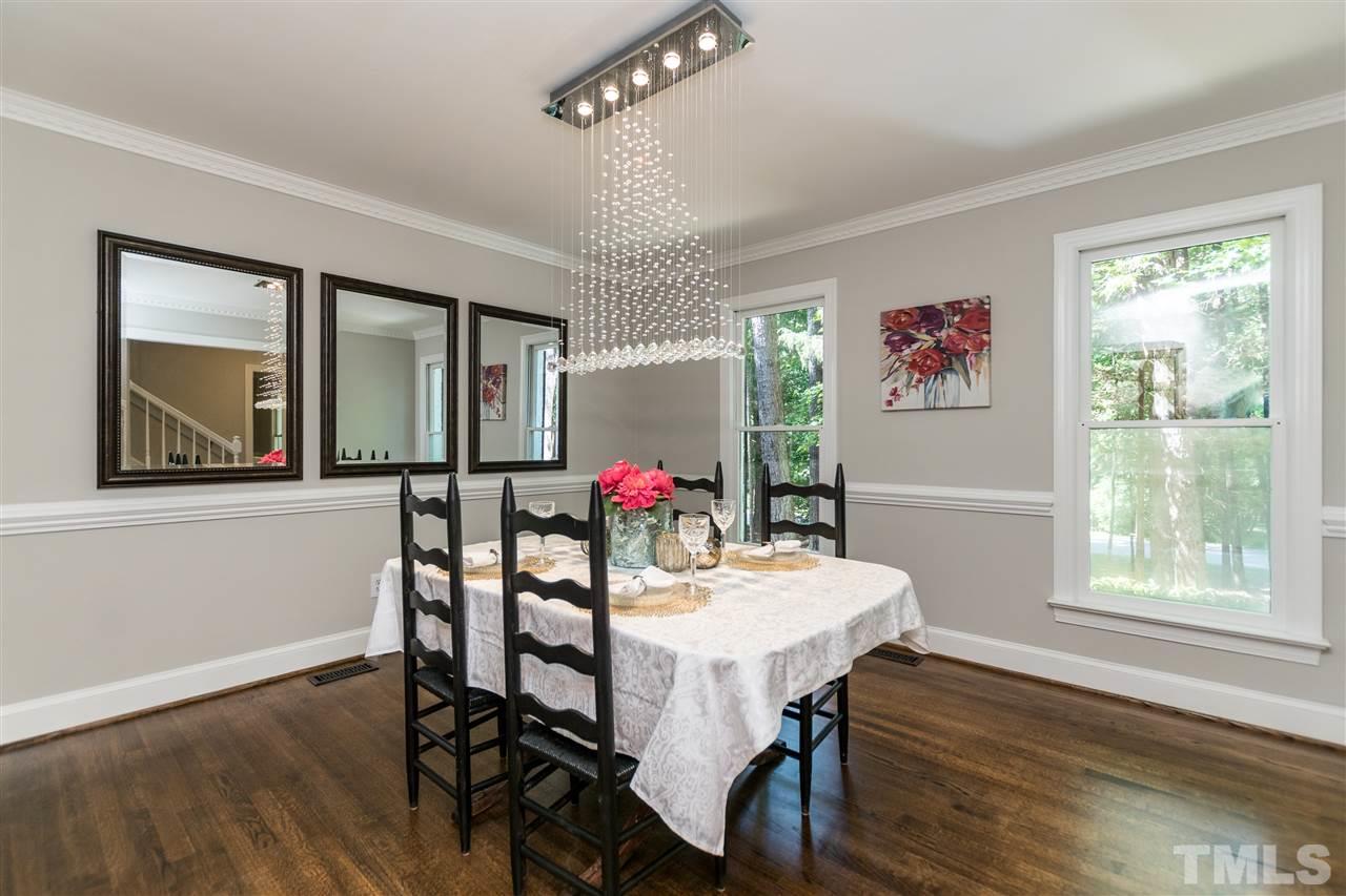 4908 Fielding Drive Raleigh, NC 27606 - Photo 10 of 25 The dining room is very spacious! My favorite part of this room is the stunning, modern crystal raindrop chandelier!