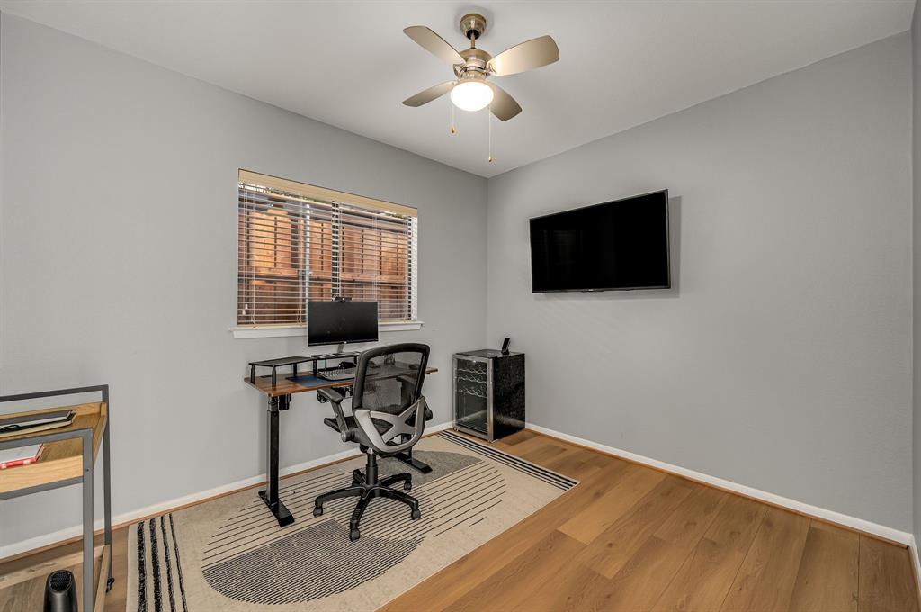 6053 Buffridge Trail Dallas, TX 75252 - Photo 15 of 40 a view of a workspace with furniture and a window