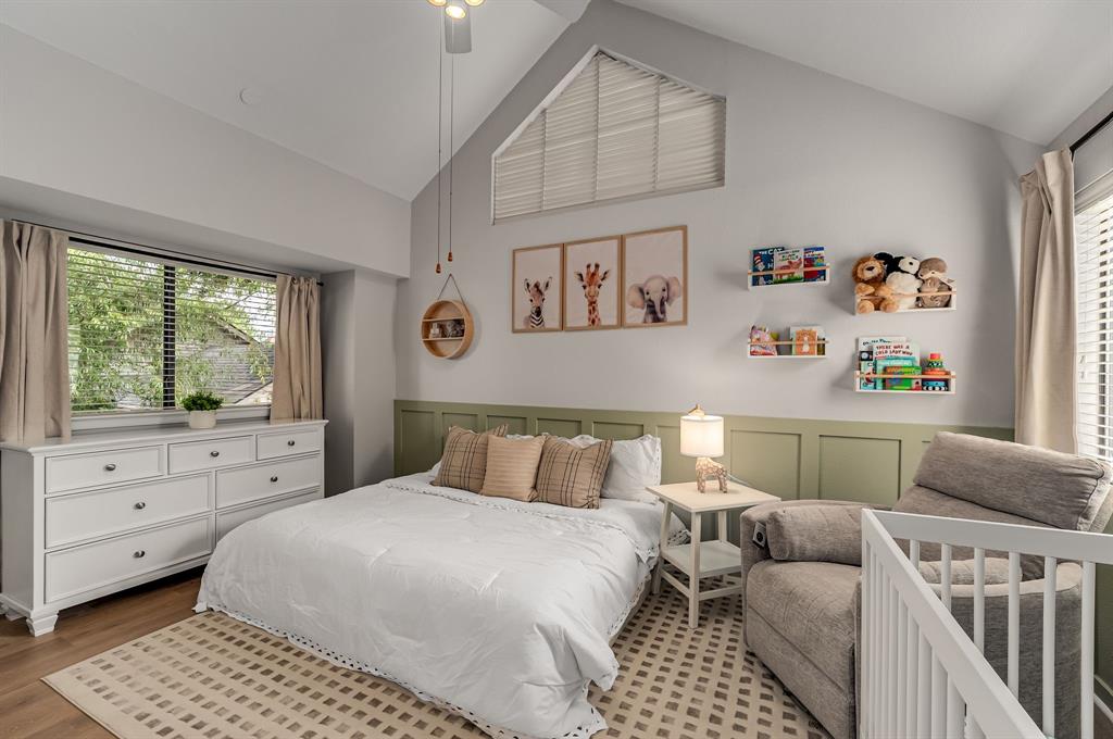 6053 Buffridge Trail Dallas, TX 75252 - Photo 18 of 40 a bedroom with a bed and a window