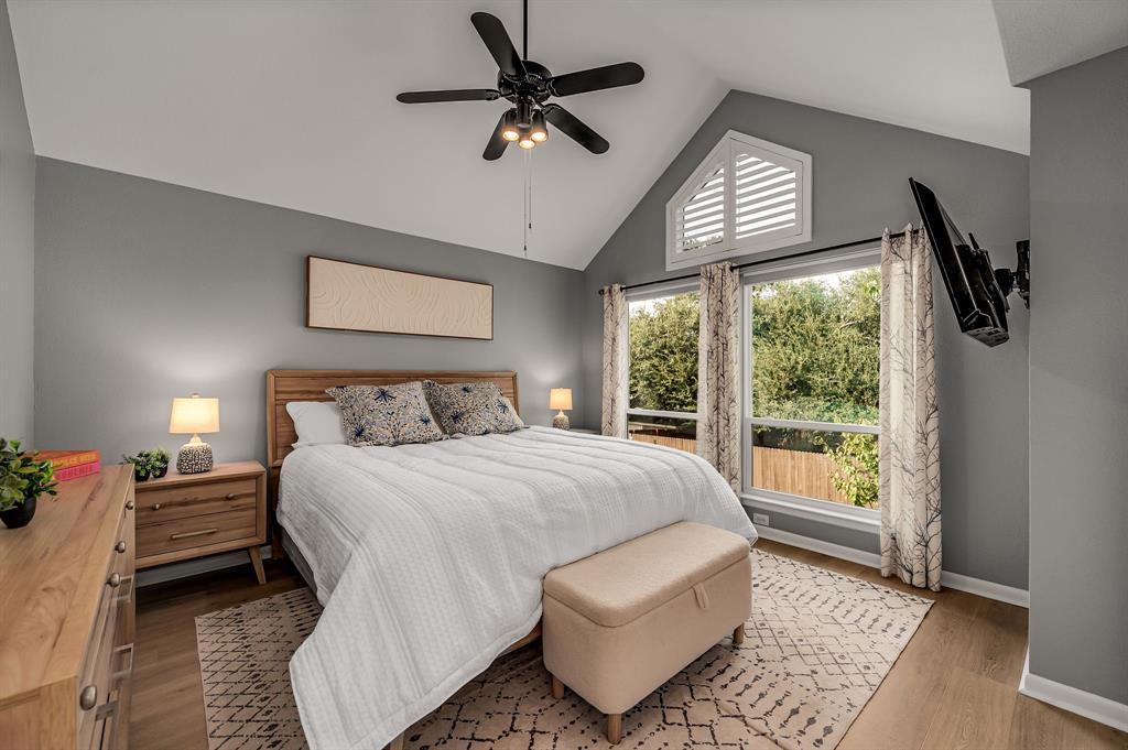 6053 Buffridge Trail Dallas, TX 75252 - Photo 20 of 40 a bedroom with a bed and window