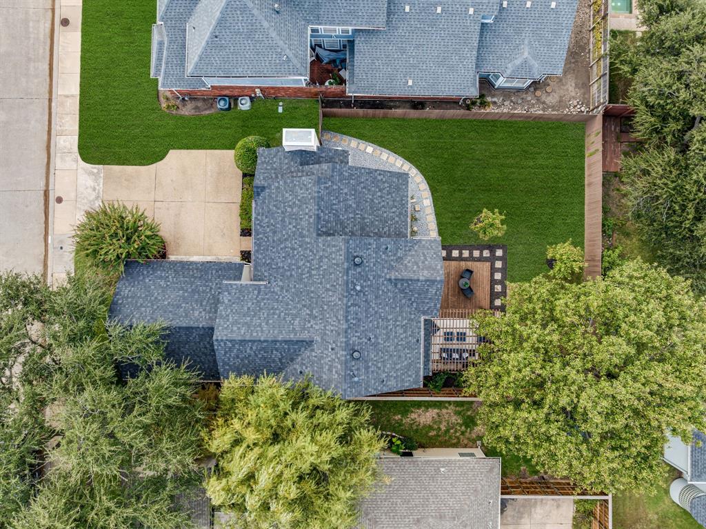 6053 Buffridge Trail Dallas, TX 75252 - Photo 34 of 40 an aerial view of a house with a garden and yard