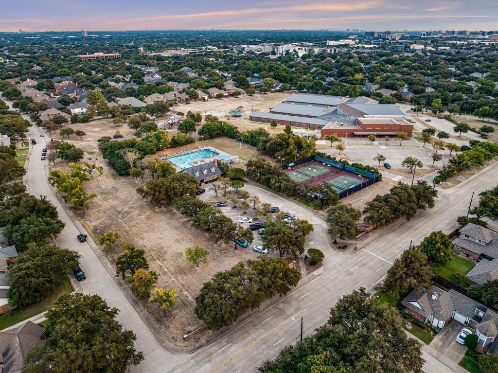 6053 Buffridge Trail Dallas, TX 75252 - Photo 40 of 40 an aerial view of residential houses with outdoor space