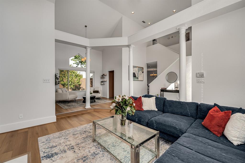 6053 Buffridge Trail Dallas, TX 75252 - Photo 7 of 40 a living room with furniture and a rug