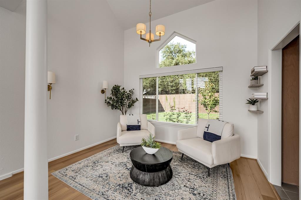 6053 Buffridge Trail Dallas, TX 75252 - Photo 8 of 40 a living room with furniture and a potted plant