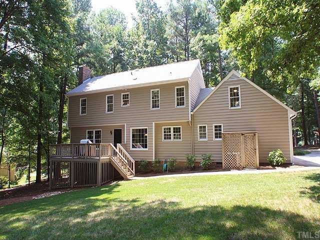 10220 Bushveld Lane Raleigh, NC 27613 - Photo 12 of 12 a front view of house with yard and green space