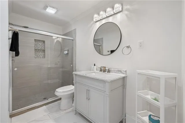 a balcony with table and chairs