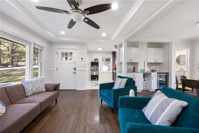 a kitchen with granite countertop stainless steel appliances and wooden cabinets