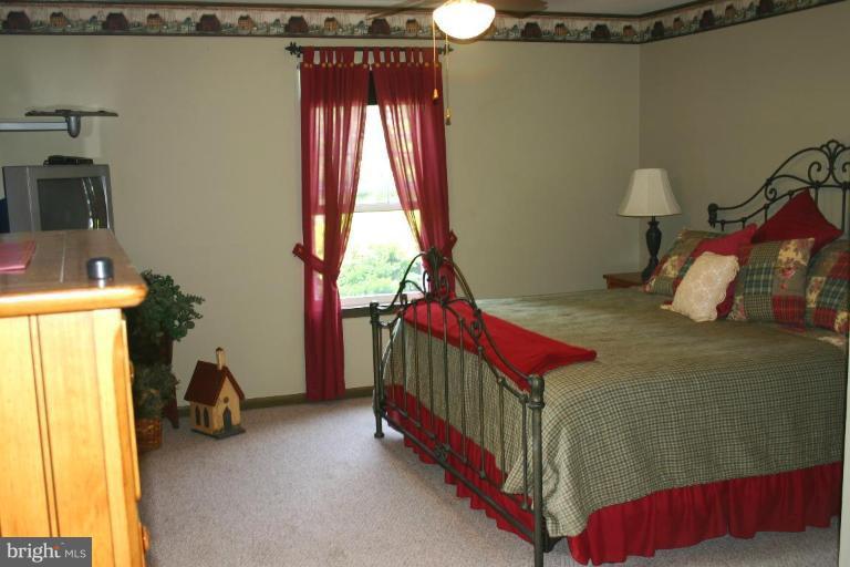 2875 Holland Cliffs Road Huntingtown, MD 20639 - Photo 16 of 17 Master Bedroom