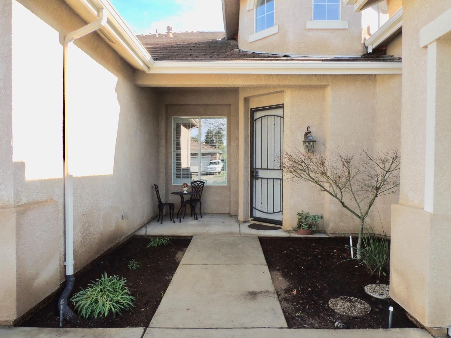 3051 Carson Avenue Clovis, CA 93611 - Photo 2 of 40 a view of a porch with seating space