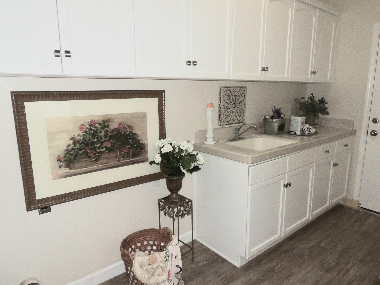 3051 Carson Avenue Clovis, CA 93611 - Photo 29 of 40 a room with a sink and cabinets