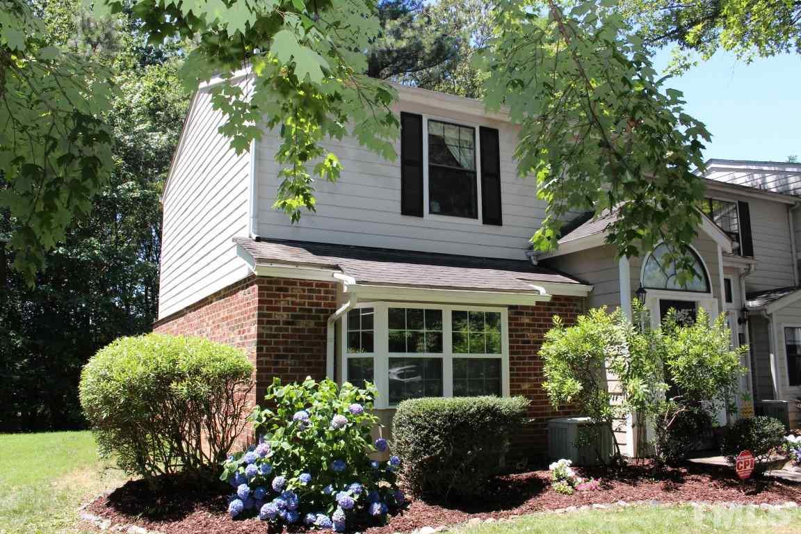 2423 Condor Court Raleigh, NC 27615 - Photo 1 of 20 a view of a house with sitting area and garden