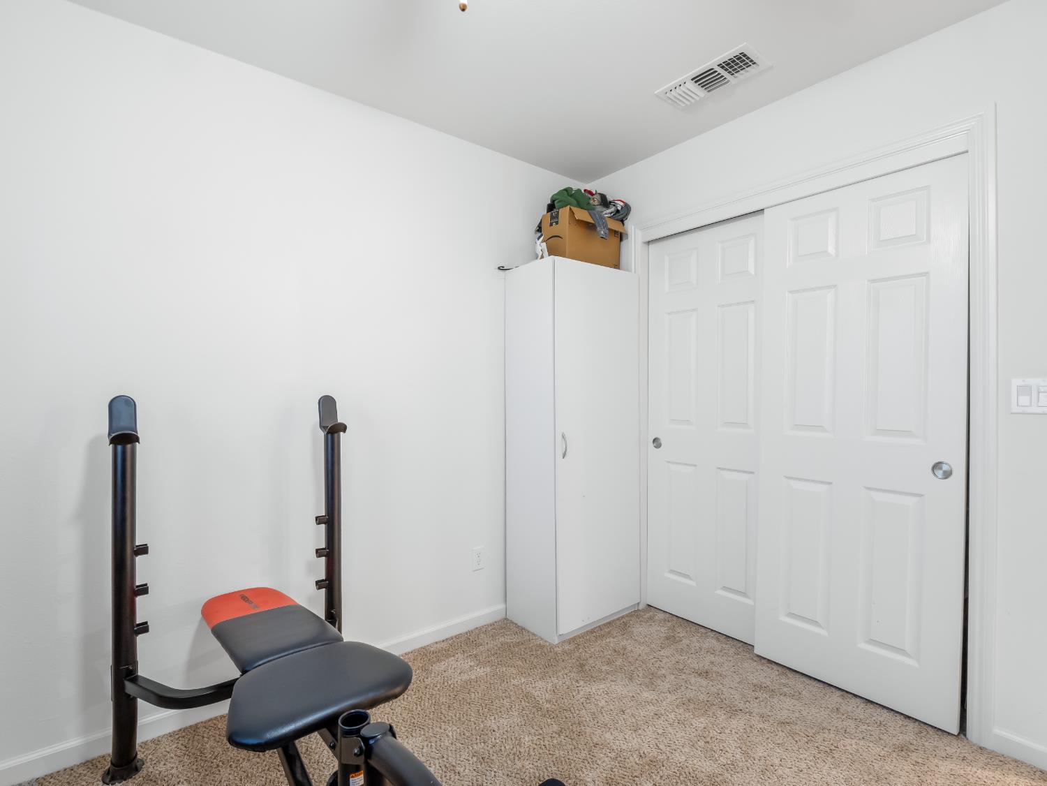 3925 Griffith Avenue Clovis, CA 93619 - Photo 7 of 40 a view of a room with gym equipment