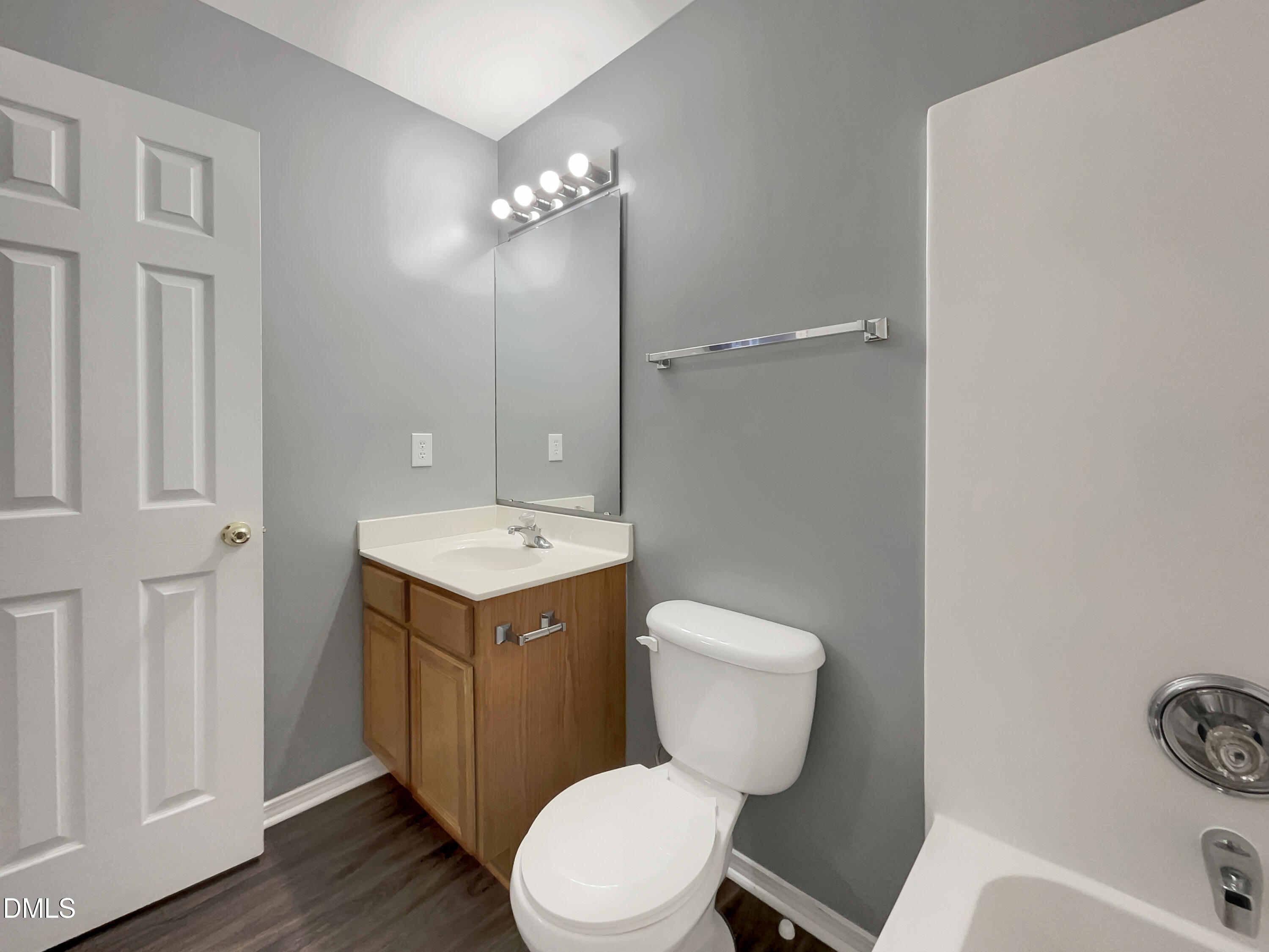 5400 Thunderidge Drive Raleigh, NC 27610 - Photo 11 of 15 a bathroom with a toilet sink and mirror