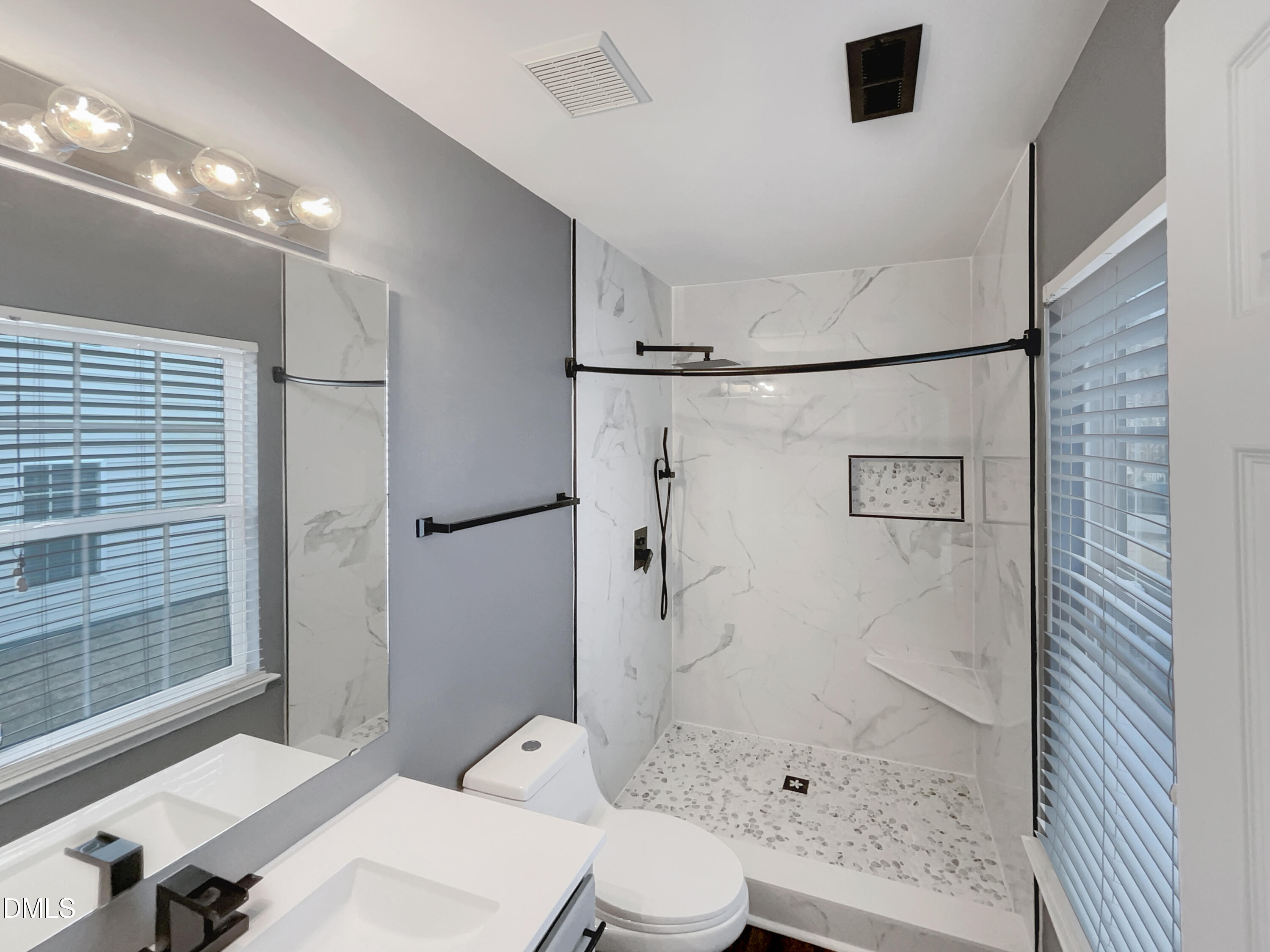 5400 Thunderidge Drive Raleigh, NC 27610 - Photo 13 of 15 a bathroom with a sink toilet and shower