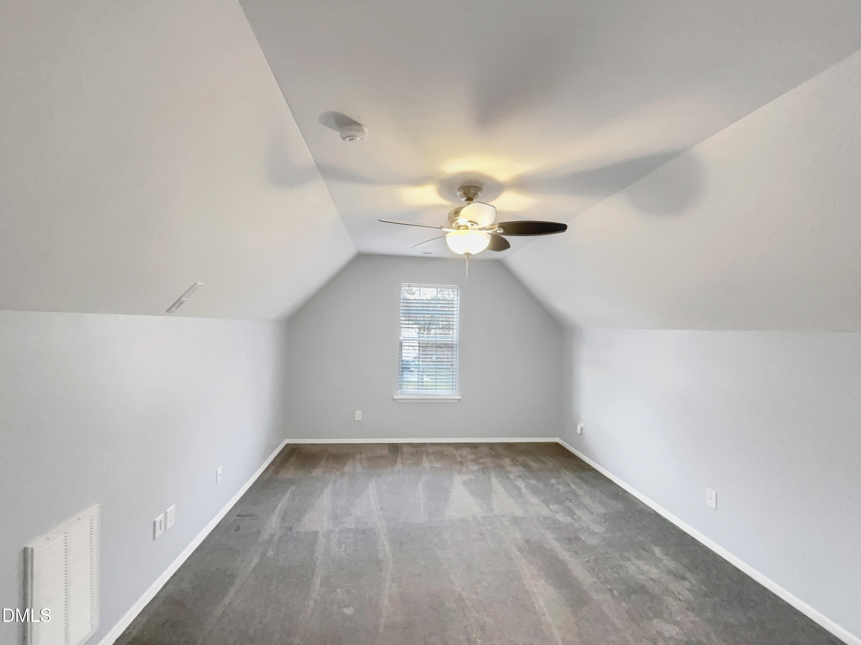 5400 Thunderidge Drive Raleigh, NC 27610 - Photo 14 of 15 wooden floor in an empty room with a window