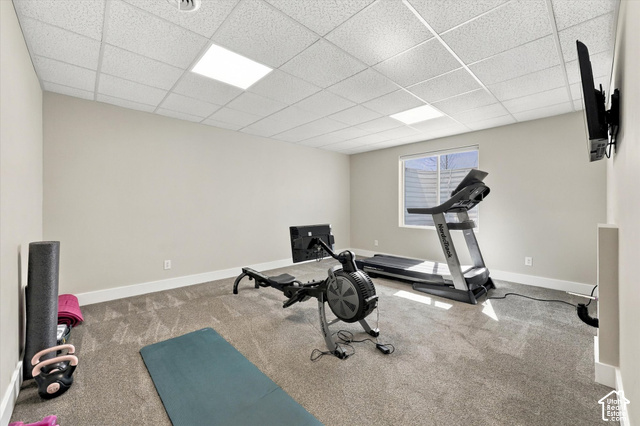 7939 Seattle Slew Road Eagle Mountain, UT 84005 - Photo 38 of 52 Recessed lighting, wall-mounted television, neutral wall color, carpet flooring, and a single window