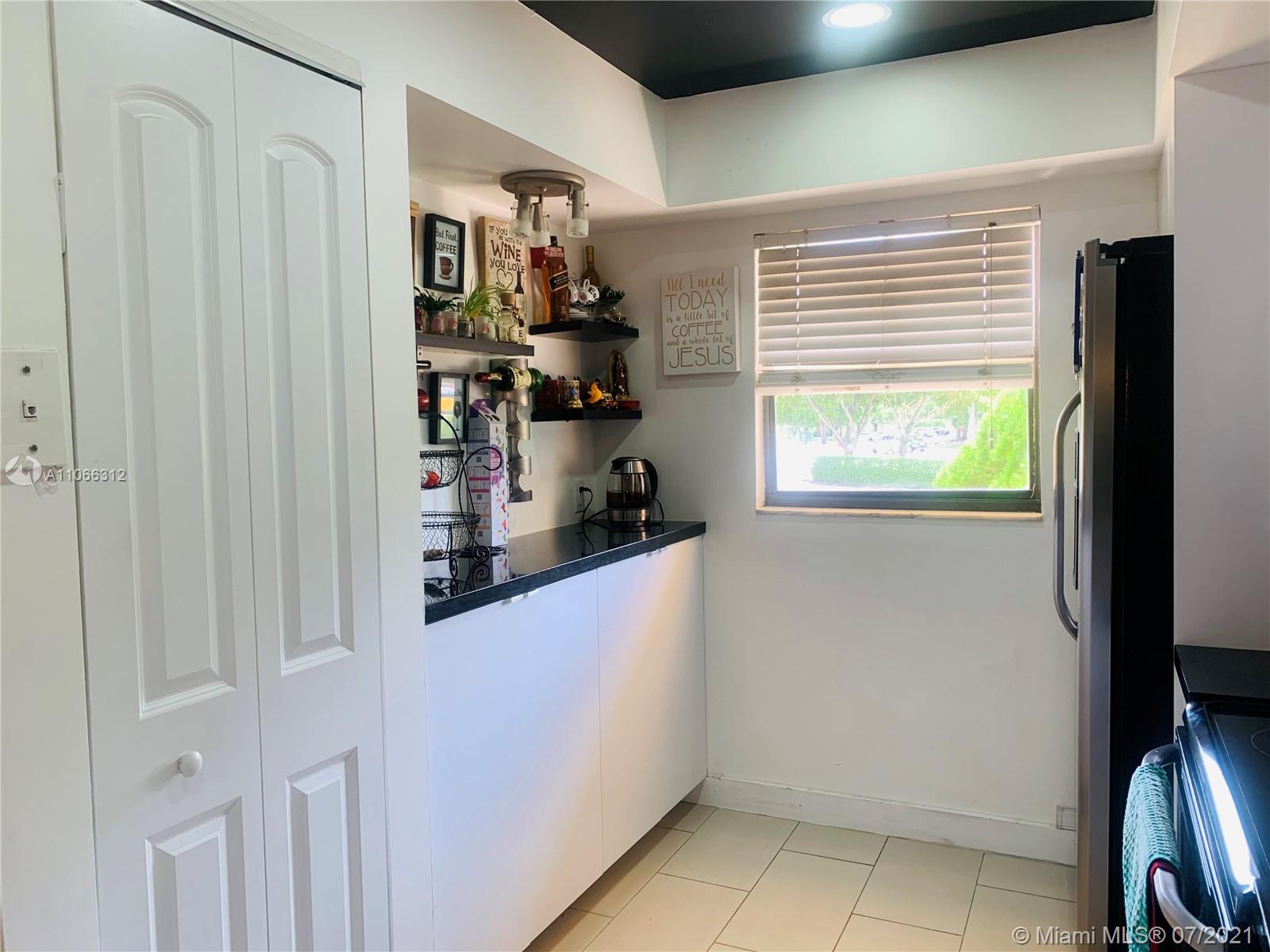 4018 Del Rio Way, Unit 4018 Sunrise, FL 33351 - Photo 16 of 94 a room with storage and utility