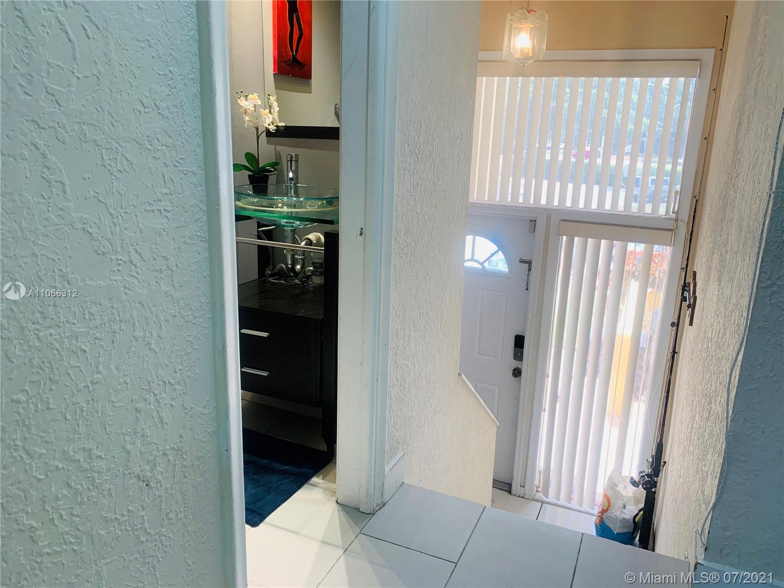 4018 Del Rio Way, Unit 4018 Sunrise, FL 33351 - Photo 22 of 94 a view of a closet area
