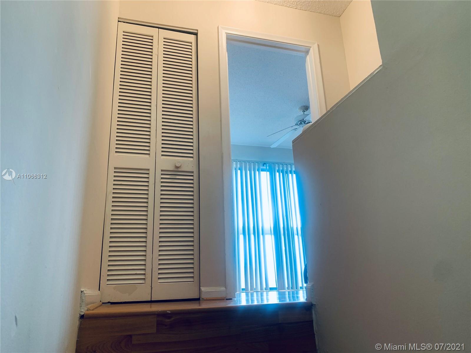 4018 Del Rio Way, Unit 4018 Sunrise, FL 33351 - Photo 62 of 94 a view of an empty room with a window