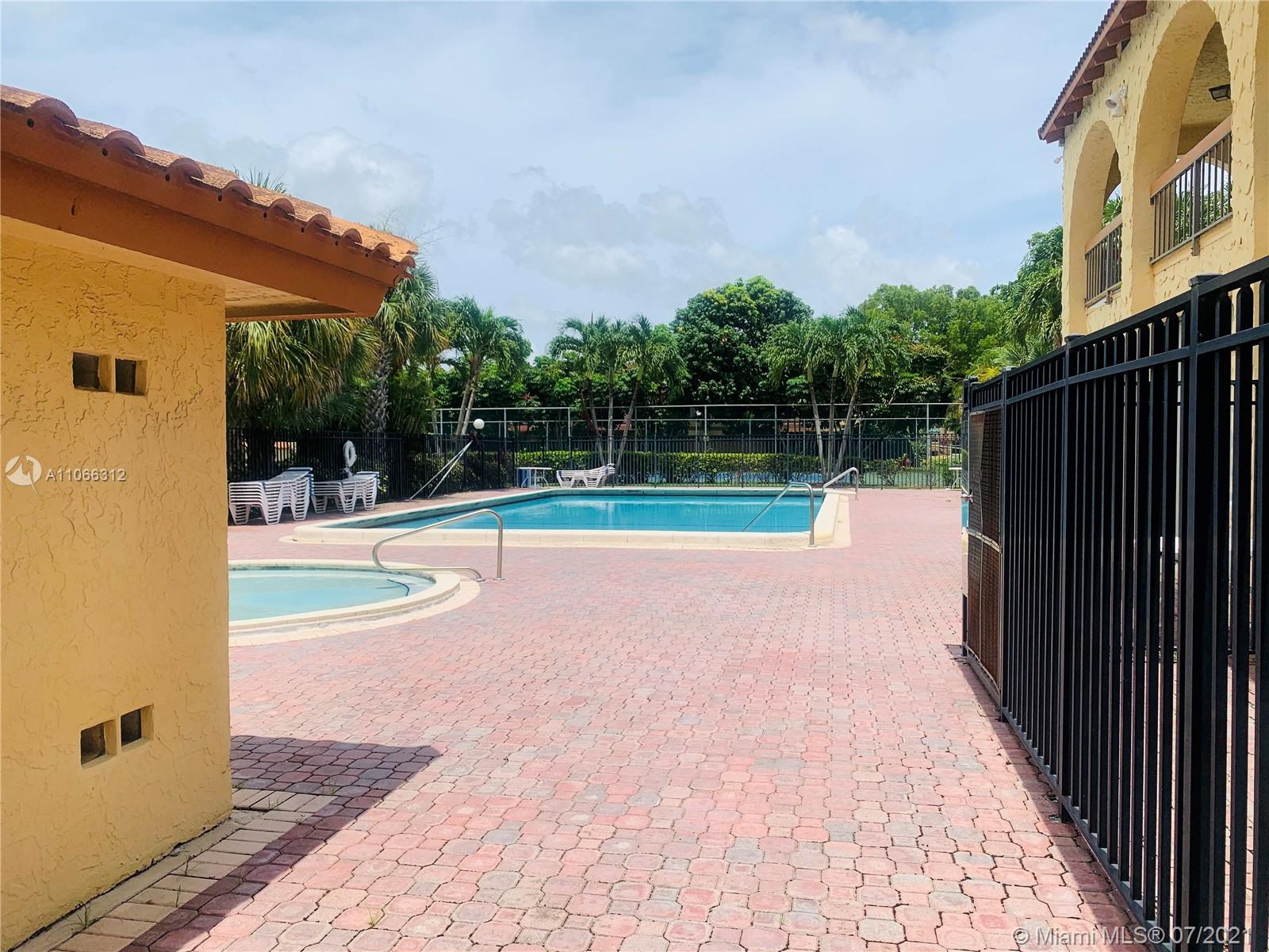 4018 Del Rio Way, Unit 4018 Sunrise, FL 33351 - Photo 84 of 94 a view of swimming pool with an outdoor space and seating area
