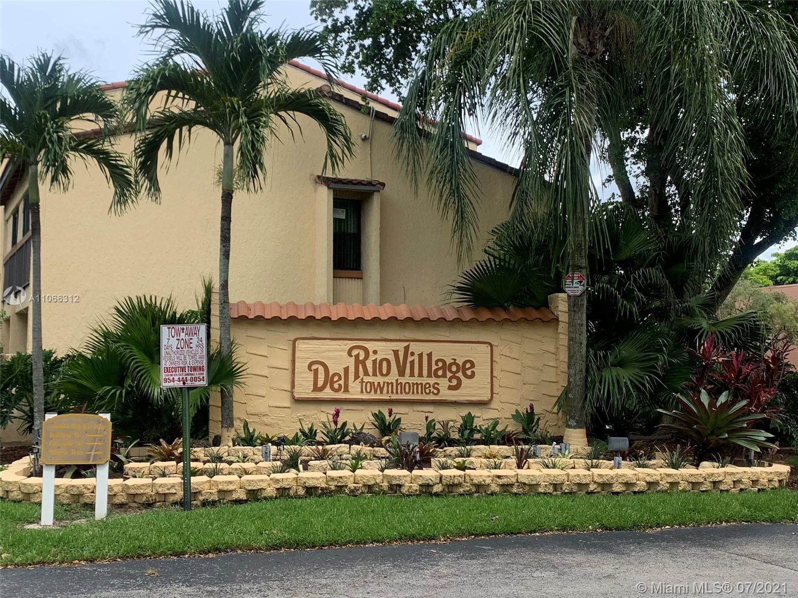 4018 Del Rio Way, Unit 4018 Sunrise, FL 33351 - Photo 91 of 94 a sign on the side of a road