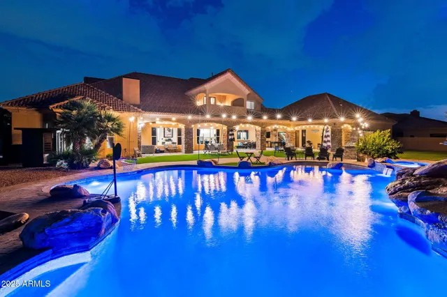 a view of a building with a yard