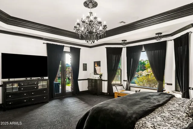 a view of a hallway to room with wooden floor and stairs