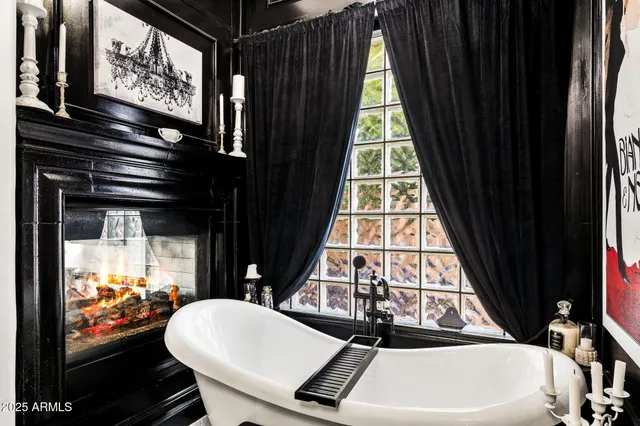 a bathroom with double sink and a mirror